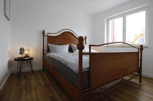 En eller flere senge i et værelse på Apartment Seeblick, Plau am See