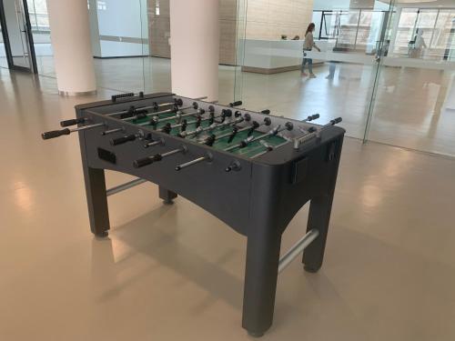 a foosball table on display in a building at Green Life Full Amenities in Punta del Este