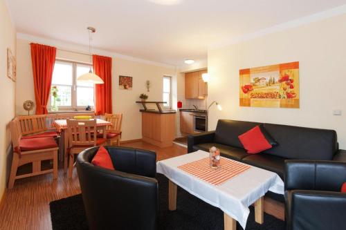 Posezení v ubytování Ferienwohnung in Bodenmais am Großen Arber