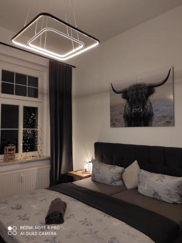Una cama o camas en una habitación de Luxury Boutique Pension
