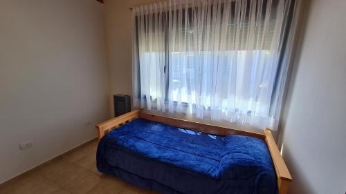 Кровать или кровати в номере Alma Patagonia