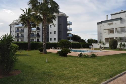The swimming pool at or close to MET&GOLF OLIVA NOVA BEACH JARDIN