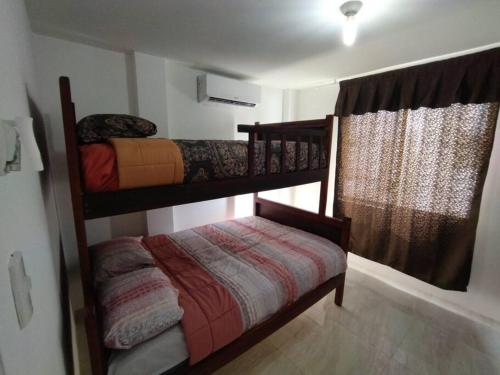 Двох'ярусне ліжко або двоярусні ліжка в номері CASA JUNTO AL MAR MARINA BAY-MIRADOR PUNTA BLANCA
