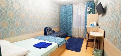 Ліжко або ліжка в номері Rent Rooms Barracuda