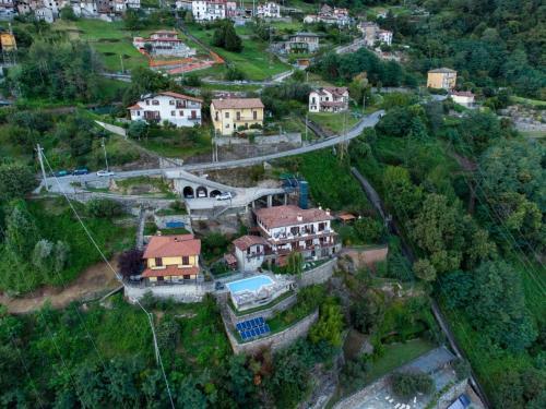 an aerial view of a house on a hill at Gravedona Lake Escape in Gravedona