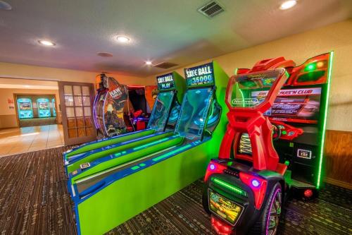 a room with two video game machines in it at Holiday Inn Club Vacations Hill Country Resort at Canyon Lake in Canyon Lake