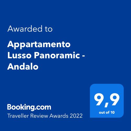 a screenshot of a phone with the text awarded to apartment libosa panamantic at Appartamento Lusso Panoramic - Andalo in Andalo
