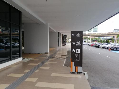 a hallway of a building with a parking lot at Astetica Residences @ Seri Kembangan in Seri Kembangan