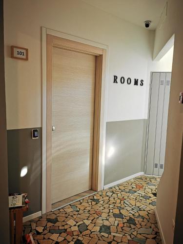 a door in a room with a tile floor at Locazione Turistica Dal Degan in San Bonifacio