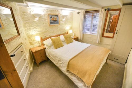 Säng eller sängar i ett rum på Penlee Narrows - Kingsand