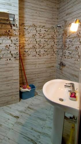 a bathroom with a white sink in a room at Casablanca Beach Hurgada in Hurghada