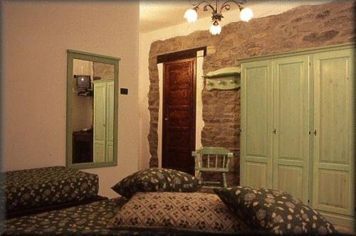 Postel nebo postele na pokoji v ubytování Hotel Les Granges