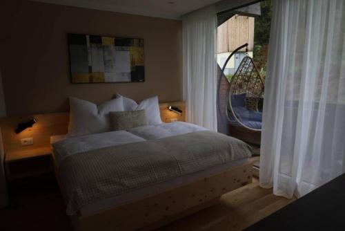 Ένα ή περισσότερα κρεβάτια σε δωμάτιο στο Appartement mit Balkon und Hallenbad
