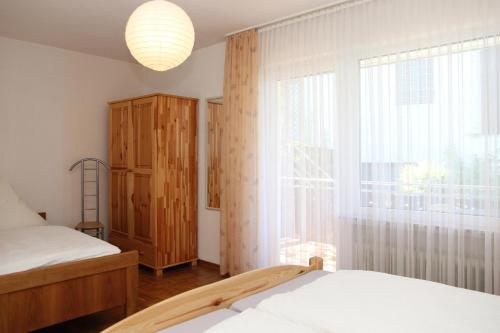 Ένα ή περισσότερα κρεβάτια σε δωμάτιο στο Ferienhaus Wahle