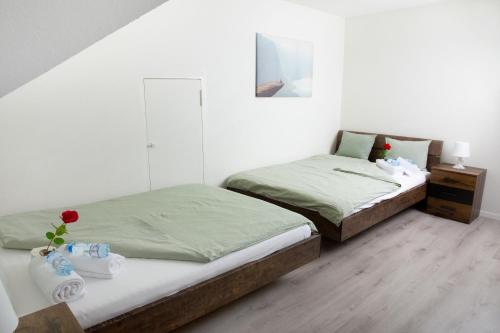 Postel nebo postele na pokoji v ubytování Simpel Rooms Vintage Rustica nähe Uni, Olma, Spital