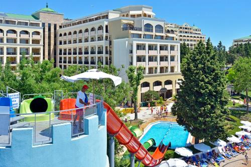 a resort with a slide and a swimming pool at Sol Nessebar Mare All Inclusive in Nesebar