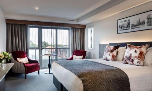 Postel nebo postele na pokoji v ubytování Rydges Latimer Christchurch
