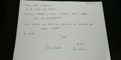 a white piece of paper with writing on it at B&B Orchidea in Palermo