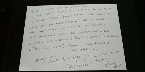 a piece of paper with handwriting on it at B&B Orchidea in Palermo