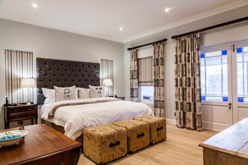 Tempat tidur dalam kamar di Karoo Masterclass - Accommodation Prince Albert