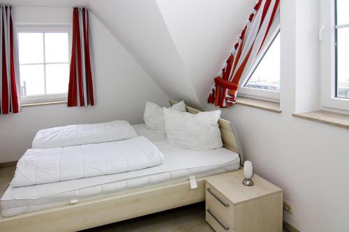 Posteľ alebo postele v izbe v ubytovaní Ferienwohnung Seemöwe im Fährhaus in Vieregge