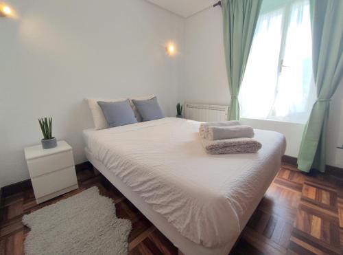 Posteľ alebo postele v izbe v ubytovaní Apartamento Lurra Barrika