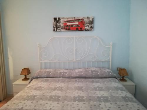 Łóżko lub łóżka w pokoju w obiekcie A casa mia