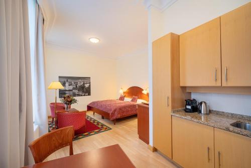 Postel nebo postele na pokoji v ubytování Hapimag Apartments Prague