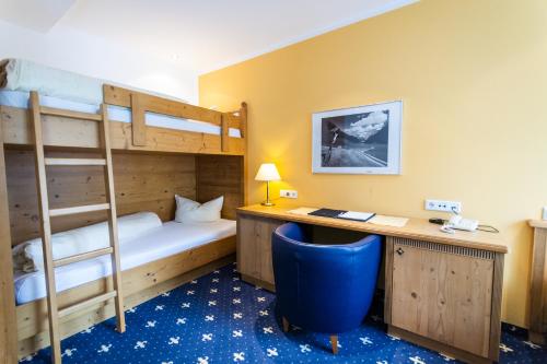 Ένα ή περισσότερα κρεβάτια σε δωμάτιο στο Appartements zur Rose