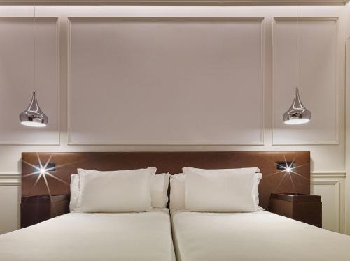 Cama o camas de una habitación en H10 Itaca