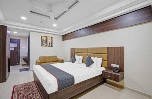 Postel nebo postele na pokoji v ubytování Alba Premier, Ahmedabad