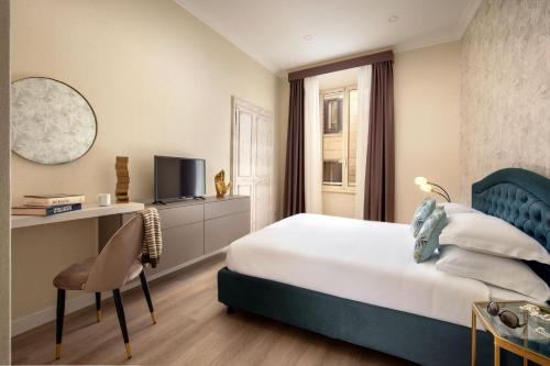 Posteľ alebo postele v izbe v ubytovaní Spanish Steps Victoria Apartment