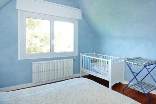 Ένα ή περισσότερα κρεβάτια σε δωμάτιο στο Holiday Home by Brehat Island & Sea Views