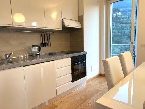 Η κουζίνα ή μικρή κουζίνα στο Camere e case vacanza Residenza Prealba