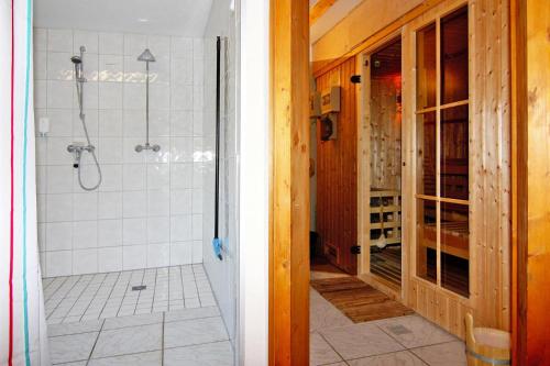 a bathroom with a shower and a walk in showeroser at Cottage, Vieregge in Vieregge