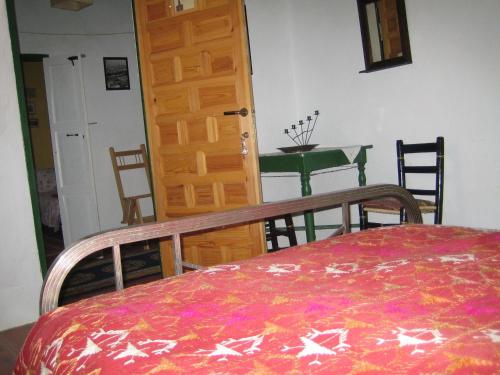 En eller flere senge i et værelse på Casa Annette
