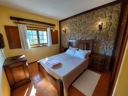 Postel nebo postele na pokoji v ubytování Casa das Vessadas
