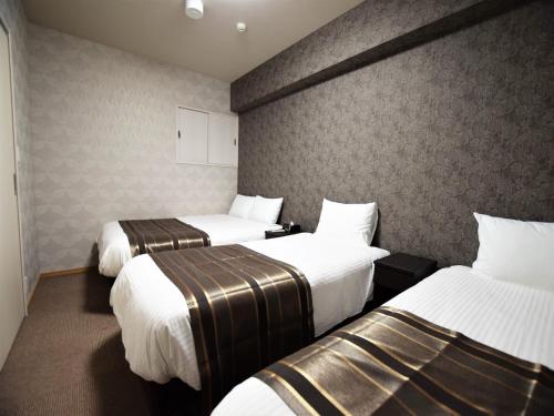 Land-Residential Hotel Fukuoka - Vacation STAY 81850v 객실 침대
