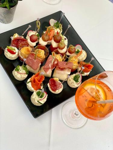 a tray of food with appetizers on a table at Hotel & Restaurant Tanne in Fischingen