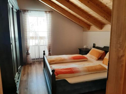 Postel nebo postele na pokoji v ubytování Ferienwohnung Leni