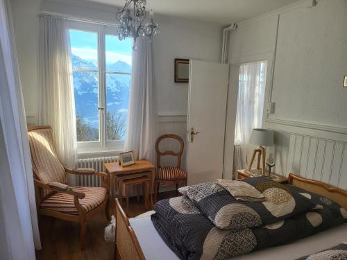 Postel nebo postele na pokoji v ubytování Alpina wiew