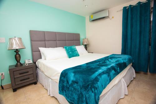 Postel nebo postele na pokoji v ubytování Diamond Gem Residence