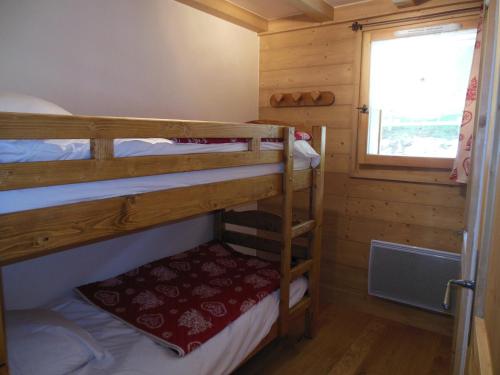 Krevet ili kreveti na kat u jedinici u objektu Alpine Lodge 4