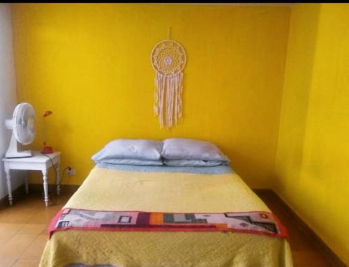 Кровать или кровати в номере Departamento del Parque -ciudad de Mendoza- 5ta sección