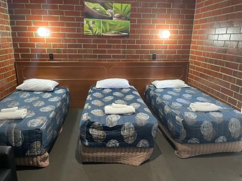 Tempat tidur dalam kamar di Pavlos Motel