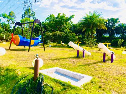 Ο χώρος παιχνιδιού για παιδιά στο Ruisui Palm Lakes B&B