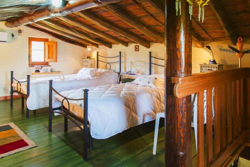 מיטה או מיטות בחדר ב-Holiday home, Castiglione di Sicilia