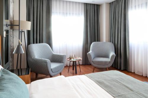 Postel nebo postele na pokoji v ubytování Expoist Hotel