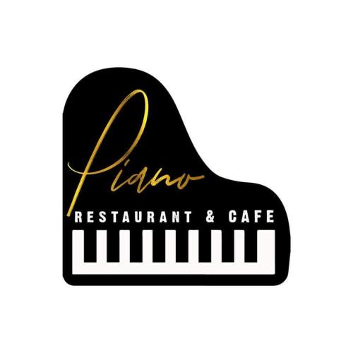 a logo for a piano restaurant and cafe at Mariana Hotel Erbil in Erbil