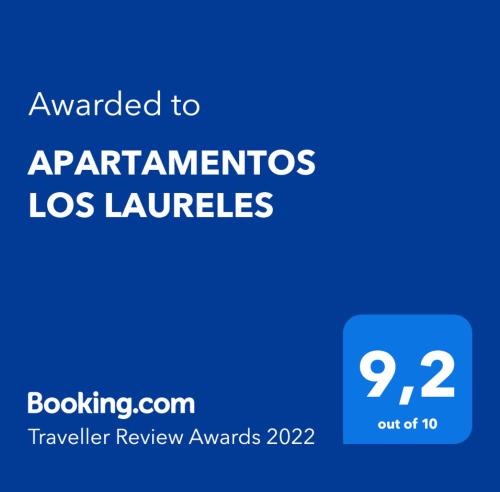a blue screen with the text awarded to organizations los landlords at APARTAMENTOS LOS LAURELES in El Médano